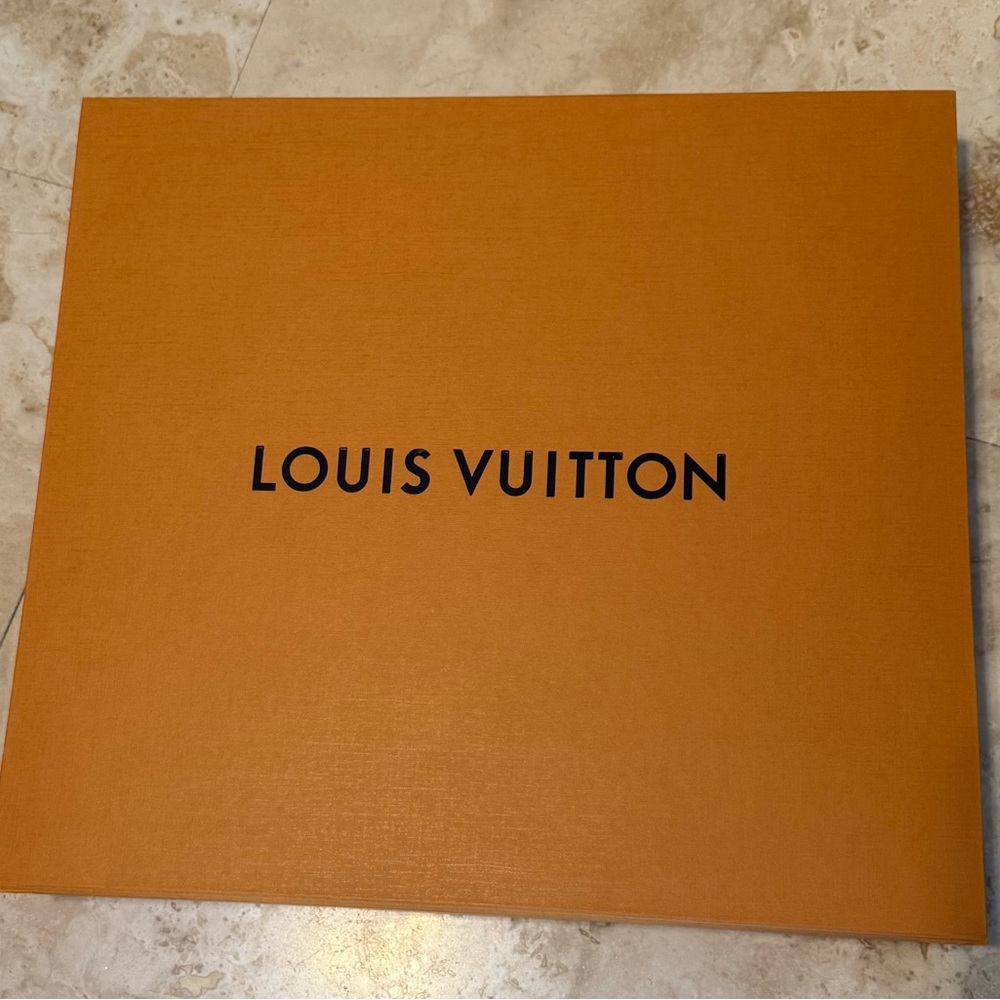 Perfect Louis Vuitton box! Would make beautiful decor for a creative person.